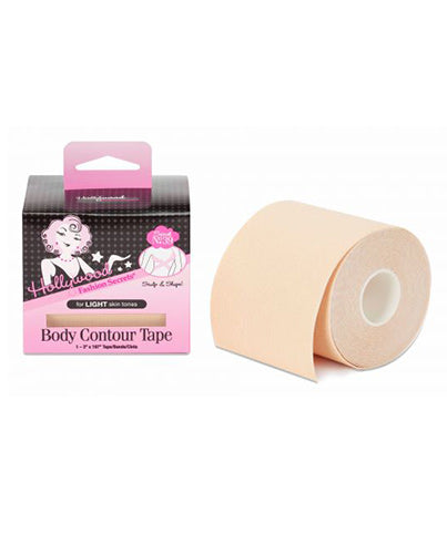A roll of beige Hollywood Fashion Secrets Body Contour Tape sits next to its pink and black box, designed for light skin tones.