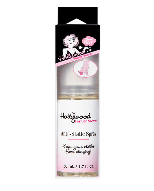 A travel-sized bottle of Hollywood Fashion Secrets Anti-Static Spray stands in its retail box to help eliminate static cling on clothing.