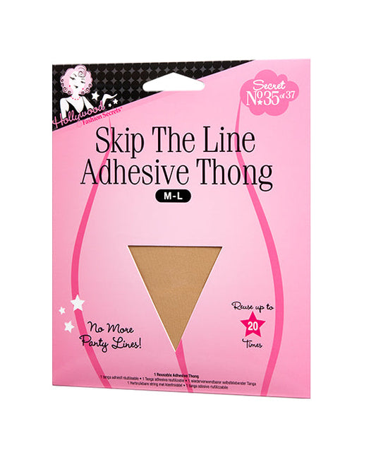 Pink Hollywood Fashion Secrets packaging displays a reusable tan Skip The Line Adhesive Thong designed to eliminate visible panty lines.