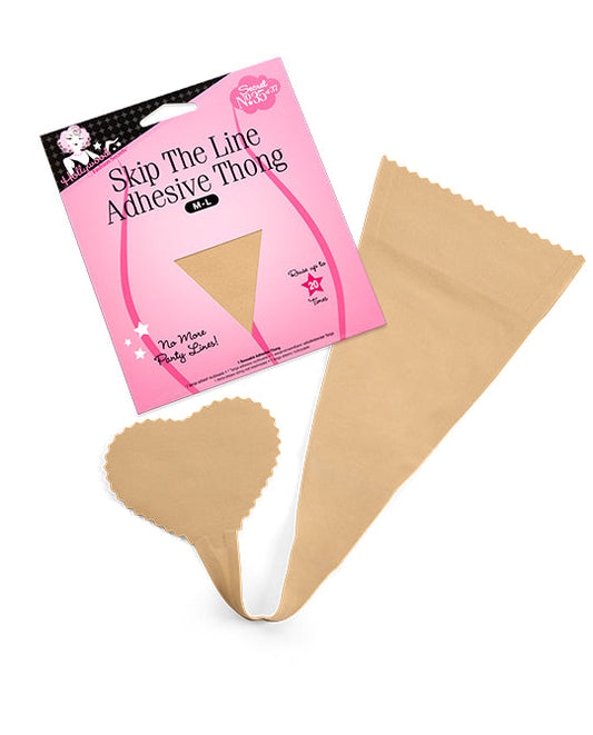 A nude Hollywood Fashion Secrets strapless adhesive thong sits beside its pink packaging, providing a seamless solution to eliminate visible panty lines.