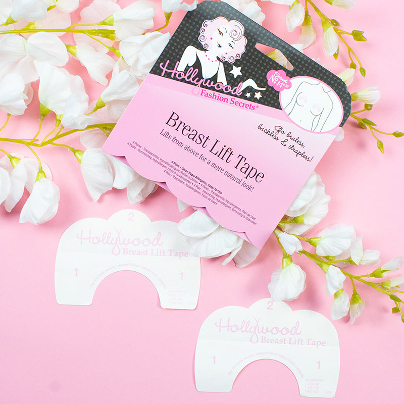 Hollywood Fashion Secrets Breast Lift Tape packaging with tapes on a pink floral background