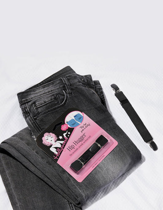 Hollywood Fashion Secrets Hip Hugger displayed on top of a pair of black jeans with a white background 