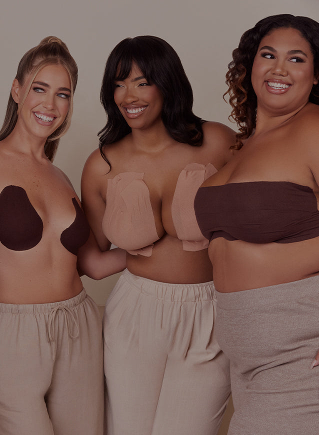 Three women wearing different styles of bras and panties against a neutral background