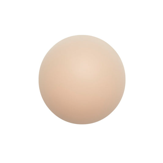 A single round silicone insert in light shade, designed for seamless, natural-looking bust enhancement and full coverage.