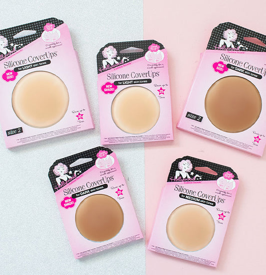 Hollywood Fashion Secrets silicone coverups in multiple skin-tone shades displayed on pink and silver backgrounds.