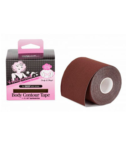 A roll of dark brown Hollywood Fashion Secrets Body Contour Tape for deep skin tones sits next to its pink and black packaging.
