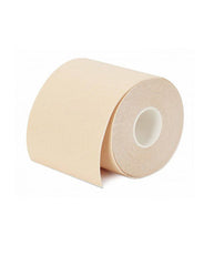 Roll of a body tape with light beige shade isolated on a white background