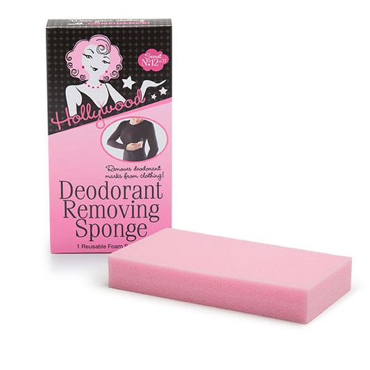 A rectangular pink reusable foam sponge sits next to its Hollywood Deodorant Removing Sponge packaging box.