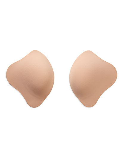 A pair of nude push-up bra pads offers a contoured teardrop shape for enhanced lift and natural cleavage.