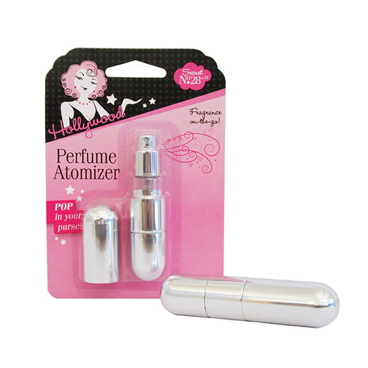 A sleek silver Hollywood perfume atomizer for travel sits next to its pink retail packaging, perfect for on-the-go fragrance.