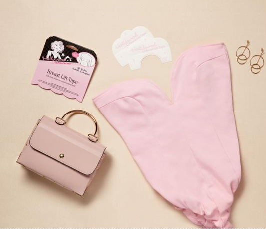 A flat lay features a pink plunging bodysuit, a matching handbag, gold hoop earrings, and Hollywood Fashion Secrets breast lift tape.