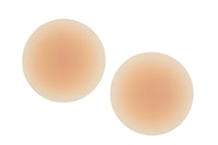 Close-up of a pair of Hollywood Fashion Secrets Silicone CoverUps for medium skin tones, offering smooth and invisible coverage.