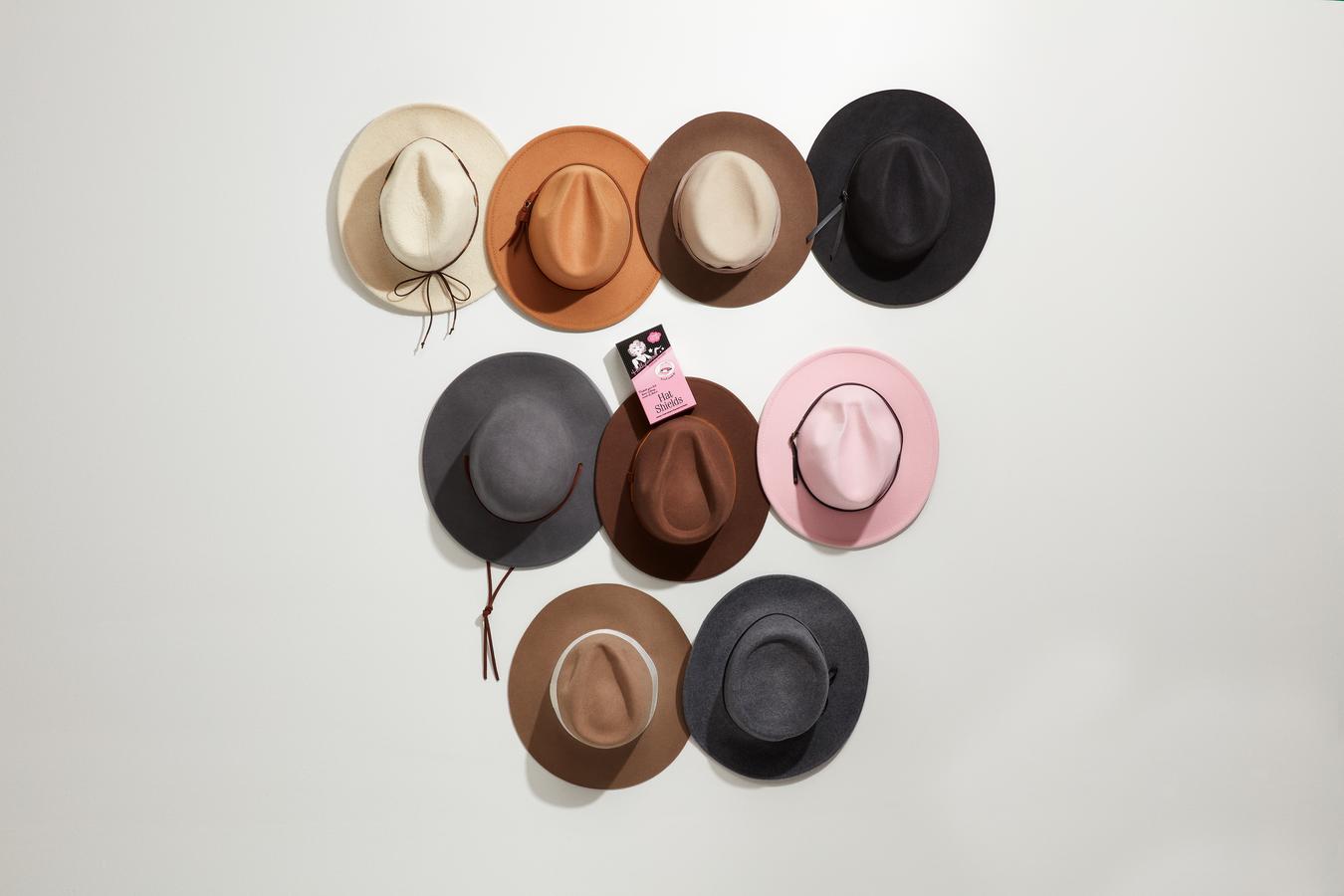 Expansive view of different kind of hats with fashion secrets item