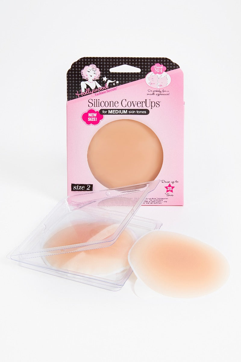 Hollywood Fashion Secrets Silicone CoverUps displayed with protective case, perfect for travel-friendly, reusable nipple concealers.