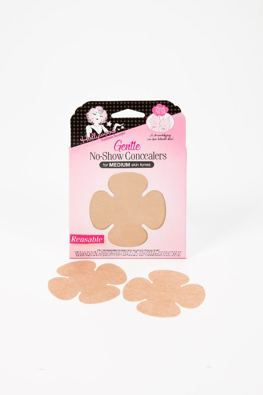 A pink package of Hollywood Fashion Secrets reusable nipple covers displays two tan flower-shaped concealers for medium skin tones.