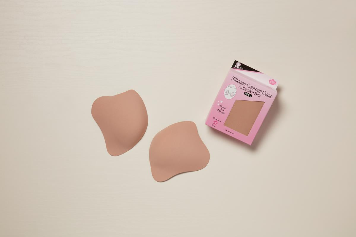 Expansive 3D perspective view of adhesive silicone cups for breast 