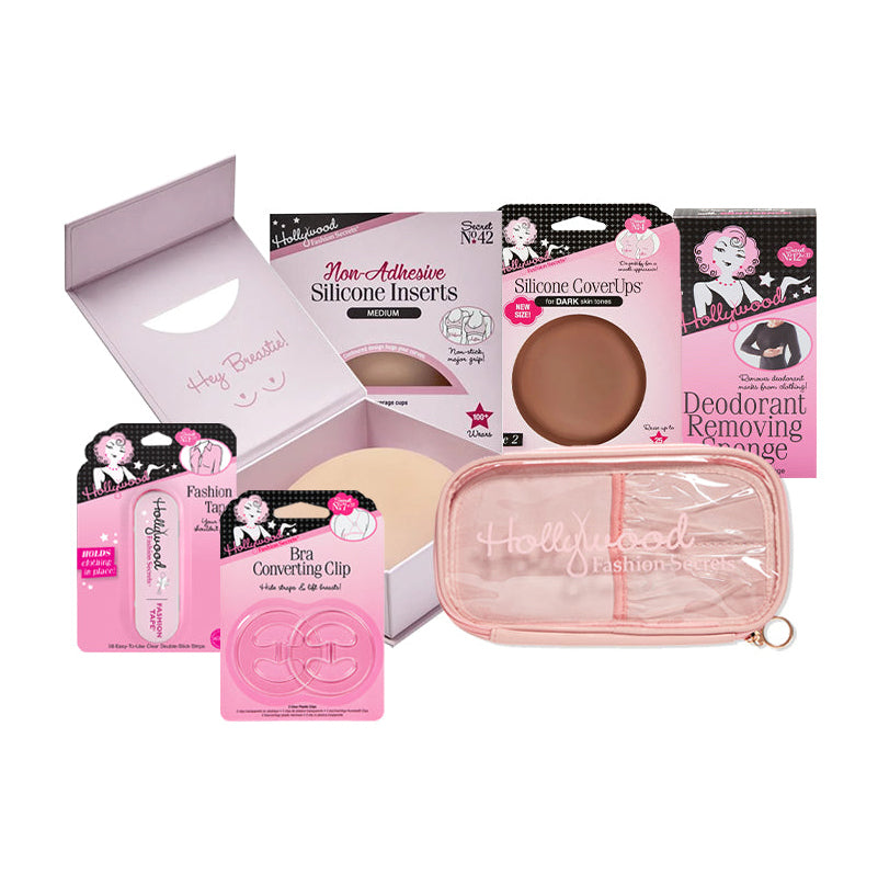 Hollywood Fashion Secrets fashion essentials set with bra inserts, silicone coverups, deodorant removing sponge, bra converting clip, fashion tape, and pink storage pouch.