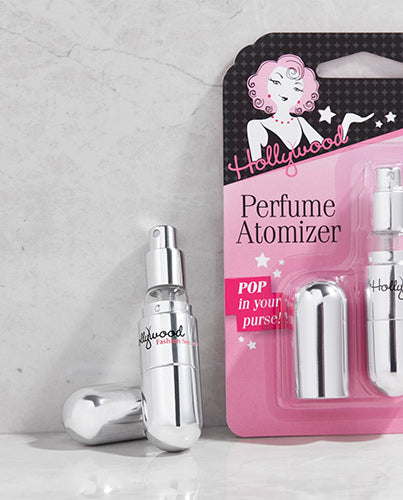 Close-up of Hollywood Fashion Secrets Perfume Atomizer with packaging, perfect for travel-sized fragrance refills.